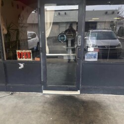 Storefront glass door