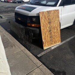 Board and broken glass which will be replaced